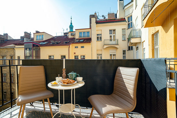 The spacious apartment with balcony located on the third floor of the beautiful  Prague, Czechia Elegant Apartment with Balcony in Pařížská street Entire serviced apartment vacation rental 50715397