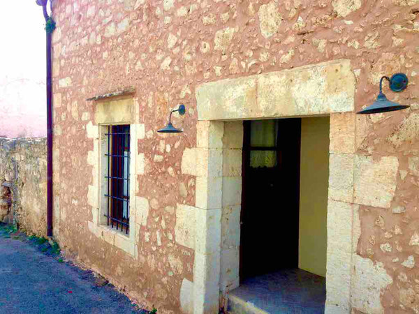 House with three levels. First level: a sitting and dining room traditionally fu Vamos, Greece Vamos Fabrica House- Family Apartment Entire home vacation rental 51762209