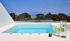 Surrender to the idyllic atmosphere of our Honeymoon Suite, the ultimate place o  Altera Pars Suites - Elegant Suite with Outdoor Heated Private Jacuzzi Room in hotel vacation rental 27619381