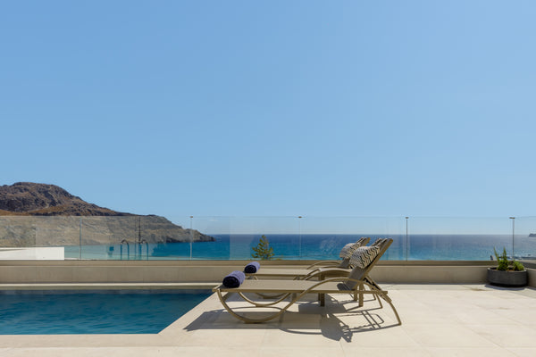 This captivating holiday home blends perfectly into its natural surroundings. It Greece Pearl Villa III, redefined island chic! Entire villa vacation rental 51556004