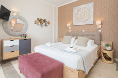 The family room is located in the east side of the hotel. This room is consistin  Pyrgos beach hotel, family room with side sea view Room in aparthotel vacation rental 28853524