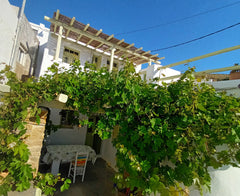 Spend your holiday in a traditional Greek house in the highest village of the Cy  Meltemi Lodge - Pomegranate Cycladic home vacation rental 50618863