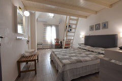 Rodakas Hotel, has 23 rooms with a total capacity of 64 people. <br />We served  Thera, Greece Spacious family room loft sea view Room in hotel vacation rental 11728079