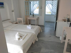 Centrally located in Perissa just 200 m from the black-sand beach, Hotel Drossos Perissa, Greece Standard Triple room Private room in bed and breakfast vacation rental 42396157