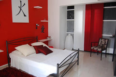 Room size 26 m²<br />Karmik Hotel is located in Afantou, near the main road of ' Afantou, Greece Deluxe Double Red Room - Rhodes Private room in bed and breakfast vacation rental 39305788