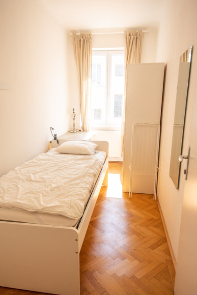 I welcome you to stay in our cozy room in an amazing location around the corner  Vienna, Austria Room by Schönbrunn Palace in shared apartment Private room in rental unit vacation rental 46728403
