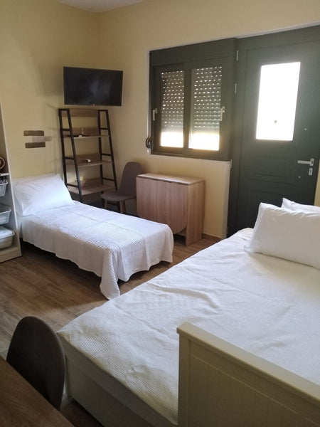 FULLY RENOVATED ACCOMMODATION IN ARCHANGELOS OF RHODES. IT CONSISTS OF 4 SINGLE   Private Room for 3 - SERAFI' COZY ROOMS No1 Private room in rental unit vacation rental 620994957144379039