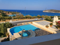 A Villa across the road from Sandy Vulisma Beach.<br />Easy walking to all the l  Villa Azure Sea - Istron, Agios Nikolaos, Crete, Entire villa vacation rental 40443990