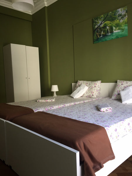 This apartment is 135 meters and it has 5 private rooms with 2 shared bathrooms  Athens, Greece Green Paradise 2 Private room in rental unit vacation rental 34193640
