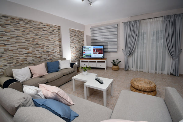 Spacious flat for 4 people, with large balcony and amazing view of the village o Greece Two Bedroom Apt with Sea View Balcony and Parking Entire rental unit vacation rental 49104047