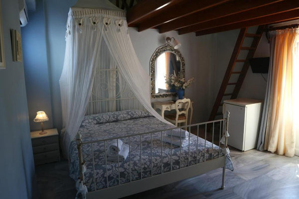 Lovely,cozy,upper floor room in a boutique hotel.<br />The room features one Que Athens, Greece Edelweiss Room at Dahlia Collection Room in boutique hotel vacation rental 52929552