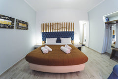Dome Luxury Rooms are located on the first floor of a renovated building in the   Dome Luxury Rooms | 1. Double room Room in hotel vacation rental 30721825