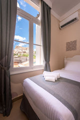 Our single room has a amazing view of Acropolis Hill<br /><br /><b>The space</b> GR Standard Single Room | Acropolis View Room in hotel vacation rental 22096169