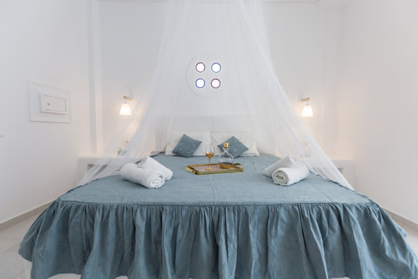 Our honeymoon Suites feature a spacious room of 35 sqm interior space, modern, t  Santorini Honeymoon suite 