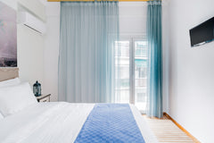 Make breakfast in a kitchen with stylishly weathered cabinetry and perch on a st GR Blue Ark Stylish Athens Entire rental unit vacation rental 24611641