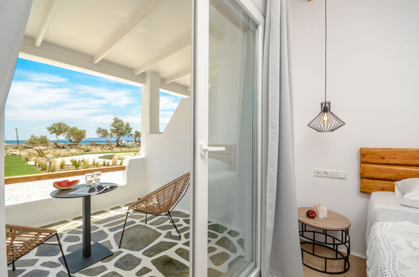 Glaronissi Beach is located on the beach of Plaka. You will be amazed by the uni  DELUXE SEA VIEW SUITE | GLARONISSI BEACH Room in bed and breakfast vacation rental 33389232