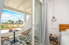 Glaronissi Beach is located on the beach of Plaka. You will be amazed by the uni  DELUXE SEA VIEW SUITE | GLARONISSI BEACH Room in bed and breakfast vacation rental 33389232