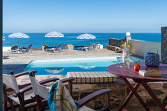 Situated directly on the sea, on a rocky seashore, in the small fishing village  Sisi, Greece Porto Sisi Cozy Sea Front Apartment Room in serviced apartment vacation rental 11854689