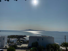 An independent appartment on the third floor of a house, located 100 meters from Athens, Greece Great Aegean View Appartment in Agios Sostis Tinos Entire rental unit vacation rental 25572879