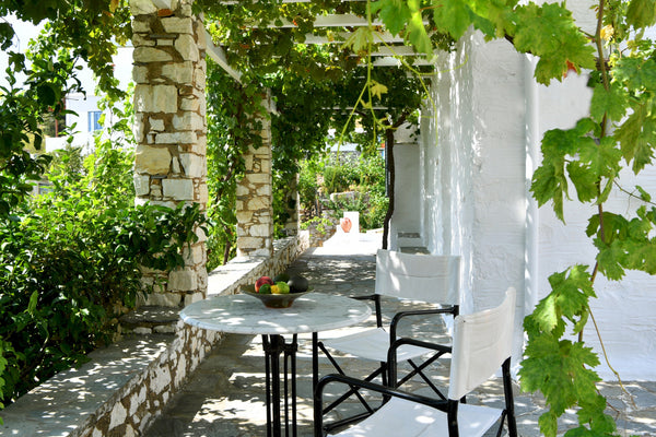 Our  traditional Cycladic stone house (65 sqm.) is located in the center of the  Greece Green House - Sea View - Lefkes Cycladic home vacation rental 27514472