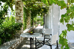 Our  traditional Cycladic stone house (65 sqm.) is located in the center of the  Greece Green House - Sea View - Lefkes Cycladic home vacation rental 27514472