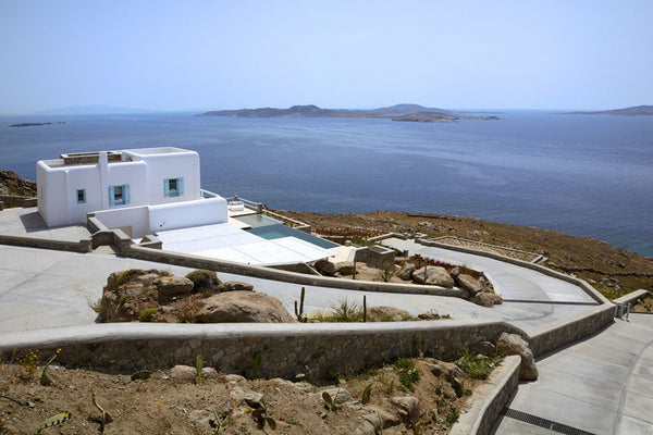 Modern Cycladic architecture is exemplified in the home’s white stucco and stone London, United Kingdom Bluebird Villas-Villa Sunbird Entire villa vacation rental 44583500