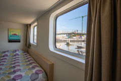 Always wanted to sleep on the water? This former captains lodge on a ship has a  Ghent, Belgium Studio Lupo - sleep on the water Houseboat vacation rental 42826387