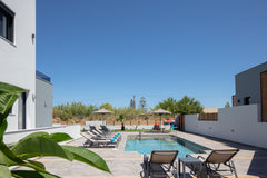Ensconced within a 350m2 plot of land, this design-led holiday home has been des Greece Sunnyside villa I, ideal for vibrant stays! Entire villa vacation rental 691108906894630365
