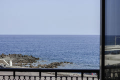 An independent apartment  is ready to accomodate you!There is a kitchen, living  Rethimnon, Greece Seaview Downtown Home Entire condo vacation rental 52064769