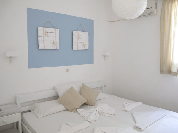 At 700 meters from the port and 100 meters from the beautiful beach of Livadia,  Paros, Greece Angelina Studios studios with private patio Entire rental unit vacation rental 13702882