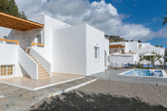 Against the backdrop of rugged mountains, the balcony and terrace views from the Greece VILLA LIANA PEFKOS LINDOS RHODES Entire villa vacation rental 12141307