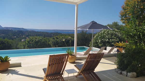 Relax in this quiet and elegant accommodation. On the heights of the village of   Villa Paradiso, vue mer à Gavalochori Entire villa vacation rental 682398147673307753