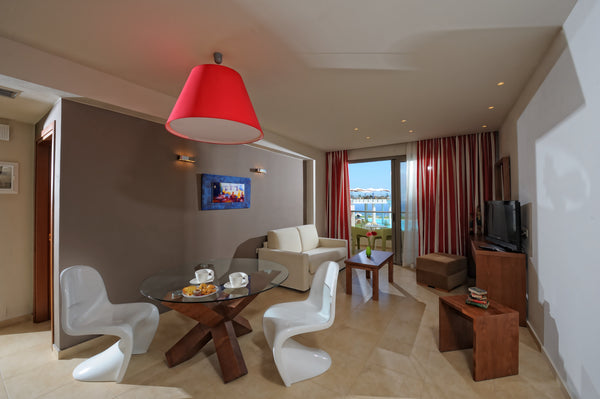 The luxurious interior of the suite and its subtle and modern decoration make up Malia, Crete, Greece Luxury 1 Bedroom Suite with Pool view Room in hotel vacation rental 54393791