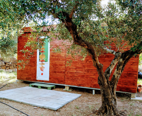 A fully detached cabin in the Kisamos countryside comprising of a kitchen, small  Wooden cabin in the olive grove by the river Tiny home vacation rental 36099755