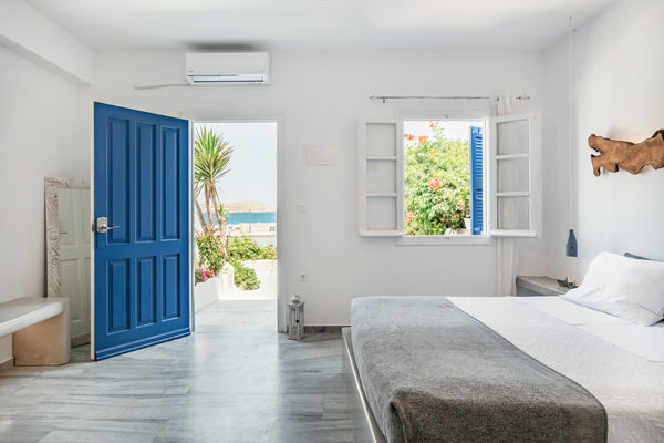 Open the sea-blue shutters and let in the cooling breeze, then whip up a snack a Naousa, Greece Amazing Sea&Sunset View Escape Next to the Beach and Center Entire rental unit vacation rental 12787402