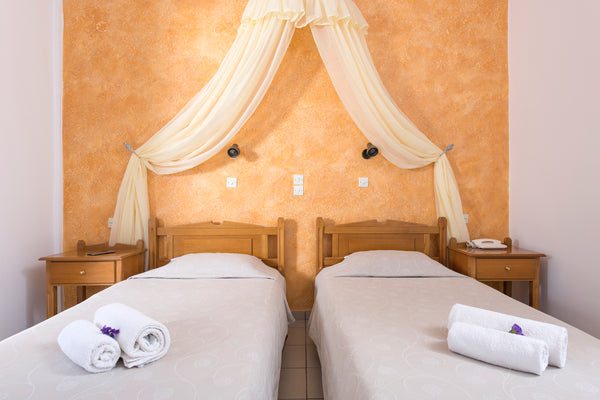 Our room is located in a quiet neighborhood, yet only a few minutes walk from Fi Greece Private room with a swimming pool in Karterados Room in bed and breakfast vacation rental 35893922