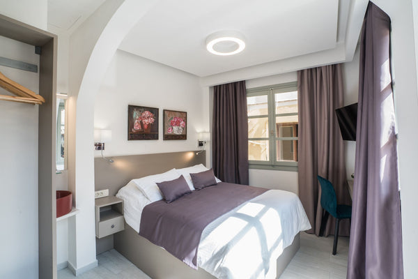Our cozy double room is a nice option for couples. The location is excellent to   Portou str. Ground floor Economy Room Room in boutique hotel vacation rental 32150358