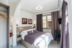 Our cozy double room is a nice option for couples. The location is excellent to   Portou str. Ground floor Economy Room Room in boutique hotel vacation rental 32150358