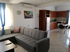 The apartment/60sqms has a cozy,minimal bedroom, bathroom,storage room,kitchen a Agios Dimitrios, Greece Mediterranean Breeze!Spacious apt nearby the beach Entire rental unit vacation rental 34413531