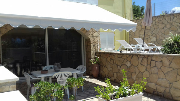 The apartment is part of a two storey 