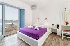 Recently renovated studios with balcony and sea view, for 1 to 2 persons with bu Greece Stratos Superior Studio Side Sea View Room in bed and breakfast vacation rental 3072259