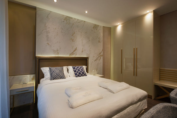 This luxury suite is air conditioned and decorated with modern minimal furniture  Two Bedroom Suite with Old Town View - Consolato Private room vacation rental 21704638