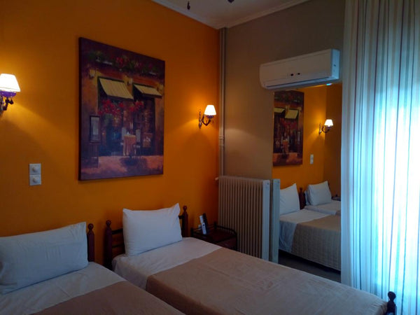 Standard Δίκλινο Δωμάτιο - με 2 μονά κρεβάτια<br /><br /><b>The space</b><br />Ό GR Standard Δίκλινο Δωμάτιο - με 2 μονά κρεβάτια Room in hotel vacation rental 28490142