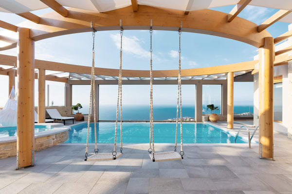 Luxury Villa sits high atop a hill overlooking AgiaPelagia Bay, where earth and  Rethimnon, Greece Minimalist Mediterranean Estate with Sea View Infinity Pool Entire villa vacation rental 12573470