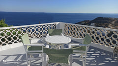 Hello from Yannisl !  Cozy rooms and a laid-back vibe. We have one of the best v  4 Bed Room 5 min walk to town + Beach. Sea Views. Room in hotel vacation rental 28040633