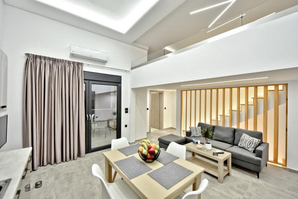 The combination of the discreet landscaping and the lighting design of the “Cret London, United Kingdom Glaukos - Crete Southside Villas Entire home vacation rental 588101041656036214