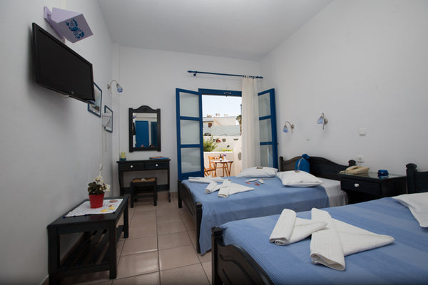 This room has one double and one single bed.  Private bathroom, A/C, direct dial  Triple room for up to 3 persons Room in hotel vacation rental 17967407