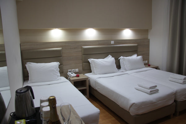 Room Size 20 m² <br />3 twin beds  <br />This triple room has a balcony and air  GR Triple Hotel Room in the heart of Athens Room in hotel vacation rental 30362367