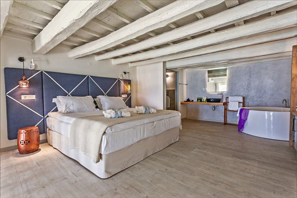 Welcome to an exclusive beachfront experience in the heart of Réthymno city. Tha Rethimnon, Greece Thalassa - Suite with Pool View - Split Level Room in boutique hotel vacation rental 23261623