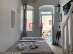 Your family or group will be close to everything when you stay at this centrally Mikonos, Greece Elenitas island house with balcony in Mykonos town Cycladic home vacation rental 560442019578729939